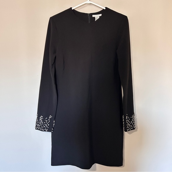 Black dress with fancy sleeves - Picture 3 of 9